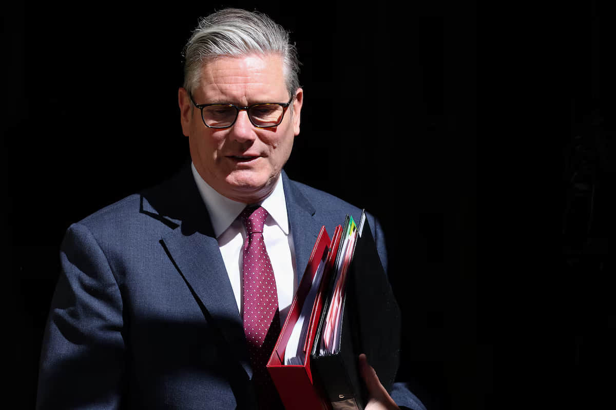 Двох українців та румуна судять у справі про підпал майна, …