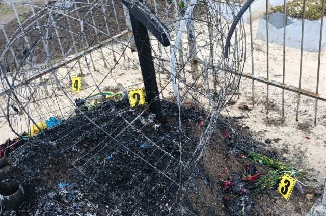 У Харківській області жінка осквернила могилу військового (фото)